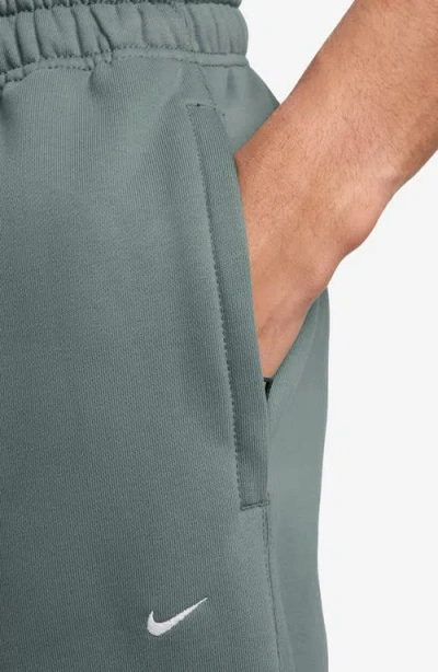 Nike Solo Swoosh Fleece Sweatpants In Green