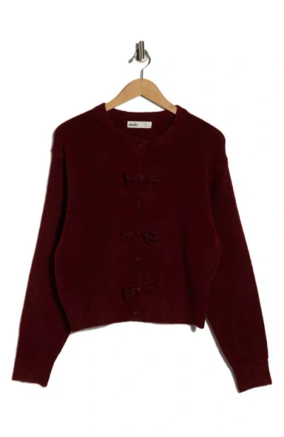 Elodie Bow Button Cardigan In Burgundy