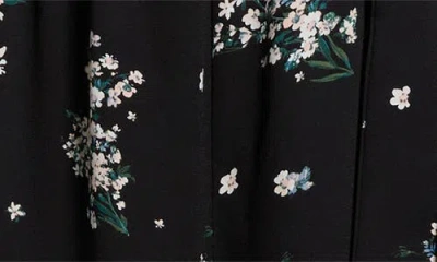 Sugarlips Magnol Floral Print Sleeveless Jumpsuit In Black