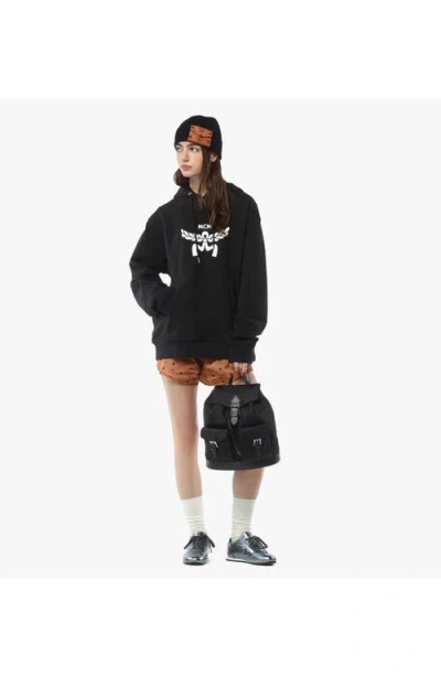 Mcm Straps Adjustable Buckle Front Pockets Top Handle In Black