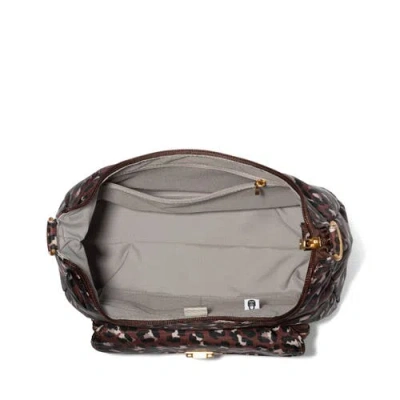 Baggallini Coastal Flip Lock Half Moon Bag In Brown