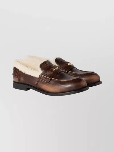 Miu Miu Bleached Leather And Shearling Penny Loafers In Animal Print