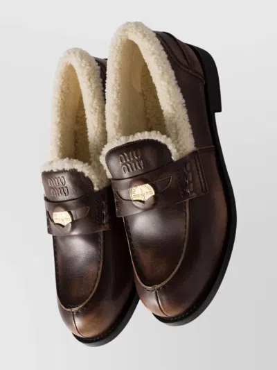 Miu Miu Bleached Leather And Shearling Penny Loafers In Animal Print