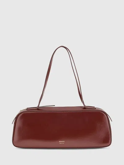 Khaite Simona Crinkled Patent-leather Shoulder Bag In Burgundy