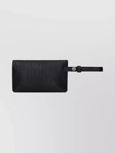 Saint Laurent Textured Leather Wrist Strap Clutch Bag In Black