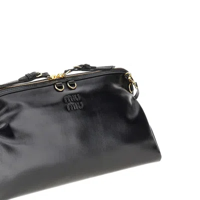 Miu Miu Shiny Leather Pouch With Straps In Black