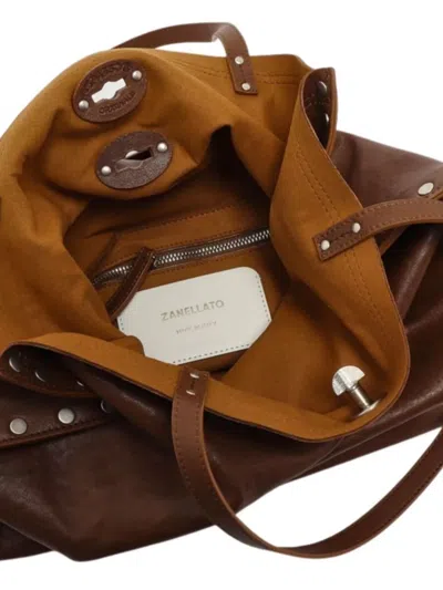 Zanellato Studded Leather Shoulder Bag With Dual Handles In Brown