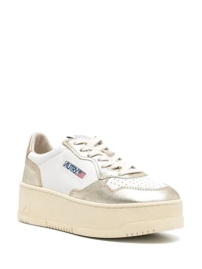 Autry Sneakers In Gold