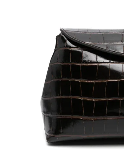 Totême T-lock Leather Clutch In Black