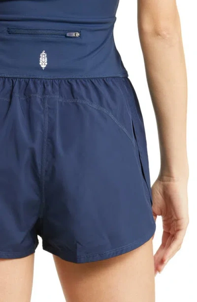 Free People Fp Movement Righteous Runsie Romper In Blue