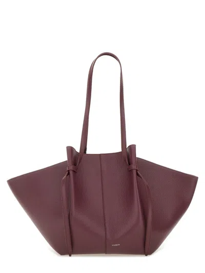 Yuzefi Shoulder Bags With Textured Finish And Long Handles In Burgundy
