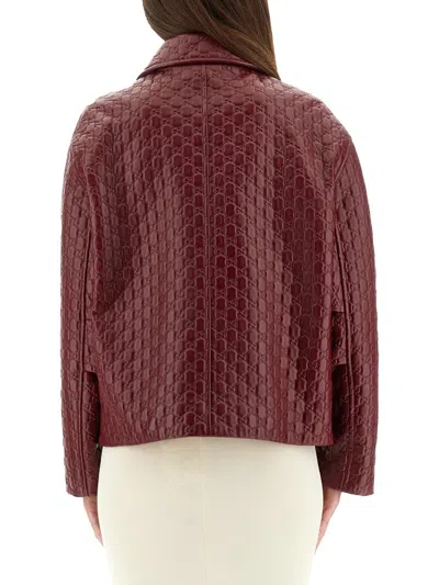 Gucci Women Oversized Leather Jacket With Embossed Gg In Red