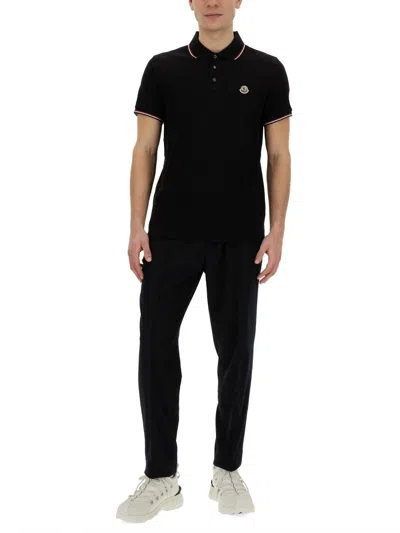 Moncler This Polo Shirt Features A Timeless Design That Transcends The Seasons In Black