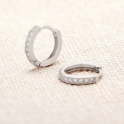 Evesaddiction Sterling Silver Petite Cz Huggie Earrings In Silver
