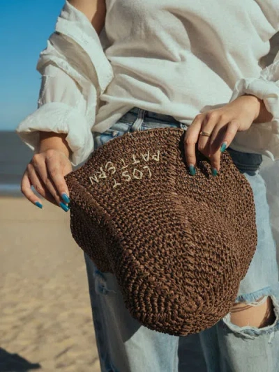 Lost Pattern Nyc "wanderlight" Packable Straw Hat In Brown