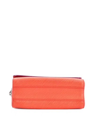 Pre-owned Louis Vuitton Twist Handbag Epi Leather Mm Crossbody Bag In Orange