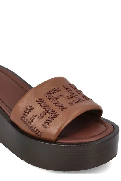 Fendi Women Brown Slides With Wedge Heel And Ff Motiv On The Band In Leather Man
