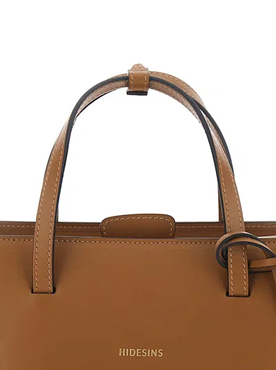 Hidesins Brown Handbag With Adjustable And Removable Shoulder Strap And Logo Lettering On The Front In Leathe In Brown
