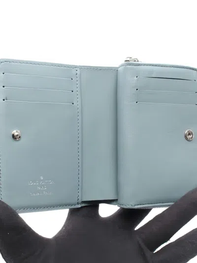 Pre-owned Louis Vuitton Embossed-monogram Zip Bi-fold Wallet In Blue