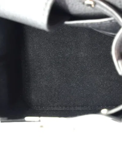 Pre-owned Louis Vuitton Lockme Leather Nano Bucket Bag In Black