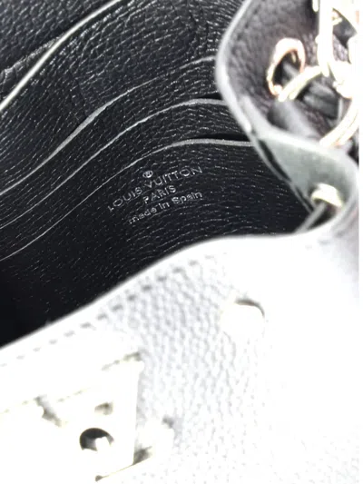 Pre-owned Louis Vuitton Lockme Leather Nano Bucket Bag In Black