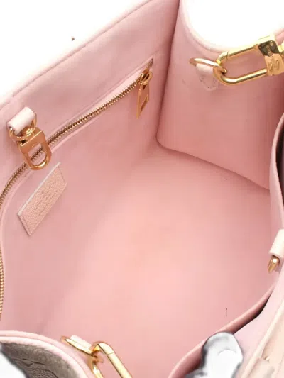 Pre-owned Louis Vuitton 2010s Onthego Pm Monogram Empreinte Tote Bag In Pink