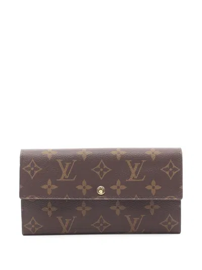 Pre-owned Louis Vuitton 2013 Monogram Bi-fold Sara Wallet In Brown