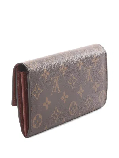 Pre-owned Louis Vuitton 2013 Monogram Bi-fold Sara Wallet In Brown