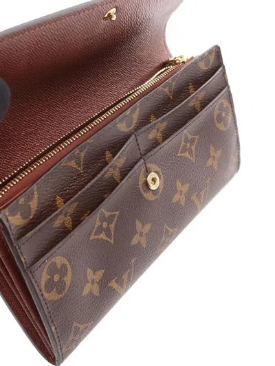 Pre-owned Louis Vuitton 2013 Monogram Bi-fold Sara Wallet In Brown