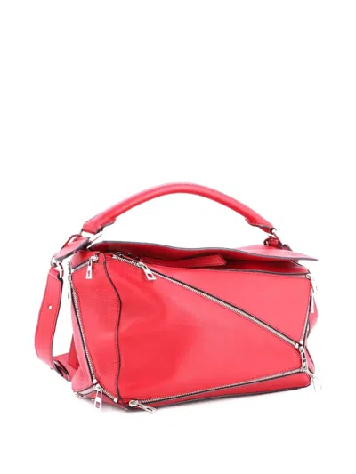 Pre-owned Loewe Puzzle Bag Zipper Embellished Leather Medium Satchel In Red