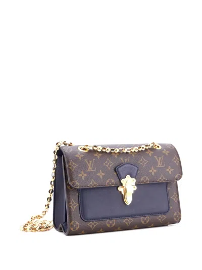 Pre-owned Louis Vuitton Victoire Handbag Monogram Canvas And Leather Shoulder Bag In Brown