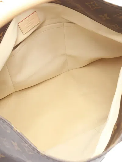 Pre-owned Louis Vuitton 2012 Artsy Mm Monogram Tote Bag In Brown