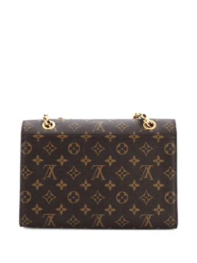 Pre-owned Louis Vuitton Victoire Handbag Monogram Canvas And Leather Shoulder Bag In Brown