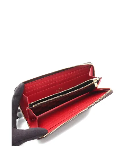 Pre-owned Louis Vuitton 2021s Zippy Damier Ebene Canvas Wallet In Brown