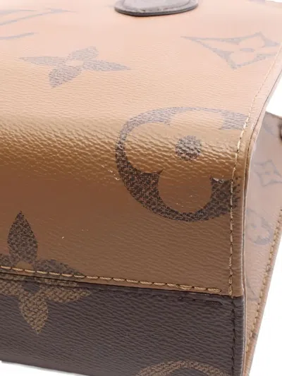 Pre-owned Louis Vuitton 2010s Onthego Pm Monogram Reverse Tote Bag In Brown