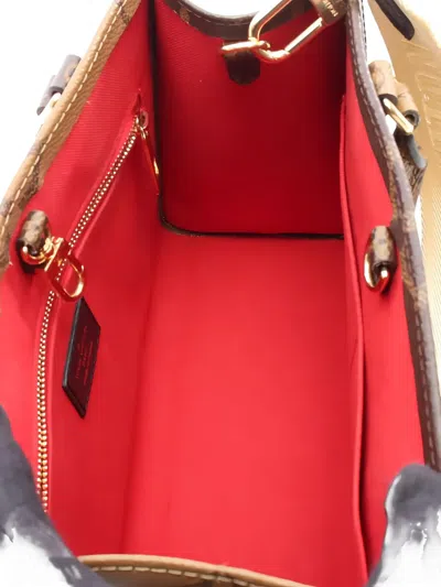 Pre-owned Louis Vuitton 2010s Onthego Pm Monogram Reverse Tote Bag In Brown
