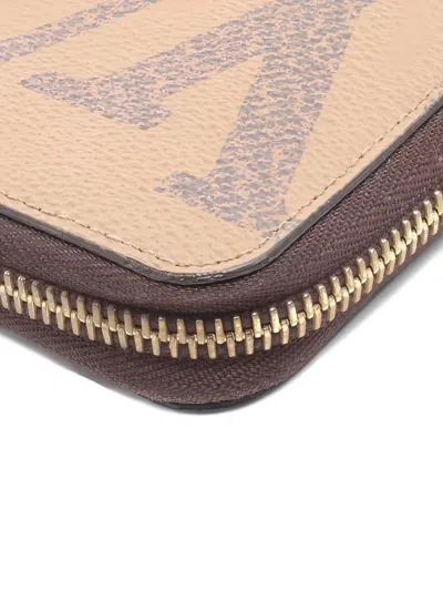 Pre-owned Louis Vuitton 2020 Zippy Monogram Reverse Wallet In Brown