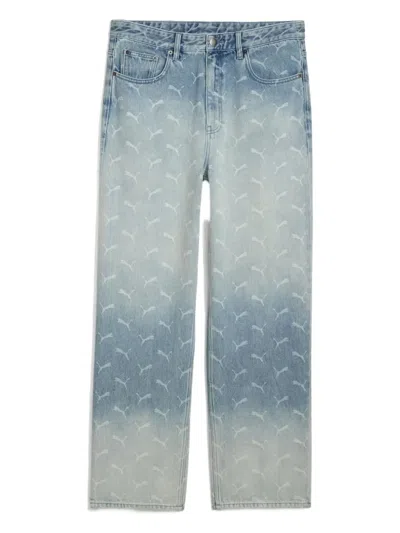 Puma Laser Monogram Denim Jeans In Blue