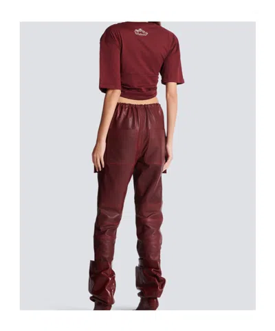 Balmain Twisted Button-embellished Top In Burgundy