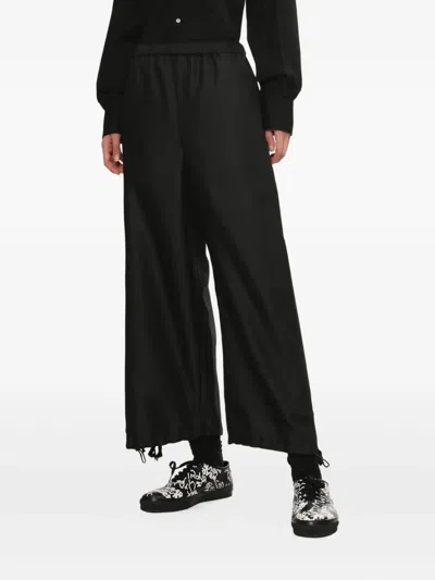 Comme Des Garçons Polyester Elastic Hem Pants In Black