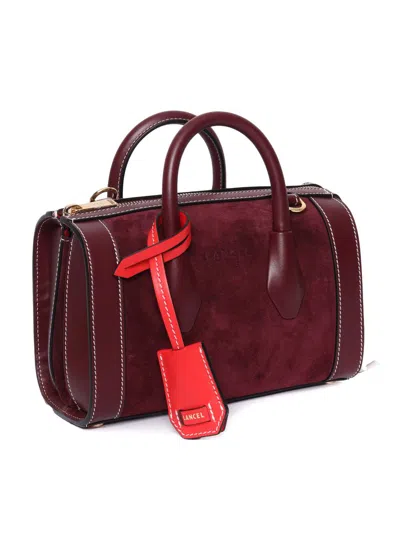 Lancel Hand Held Bag. In Red