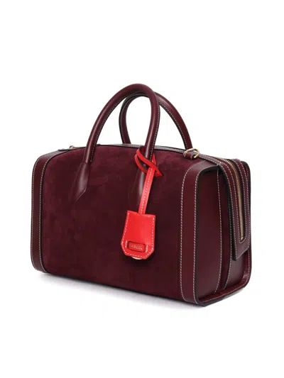 Lancel Hand Held Bag. In Red