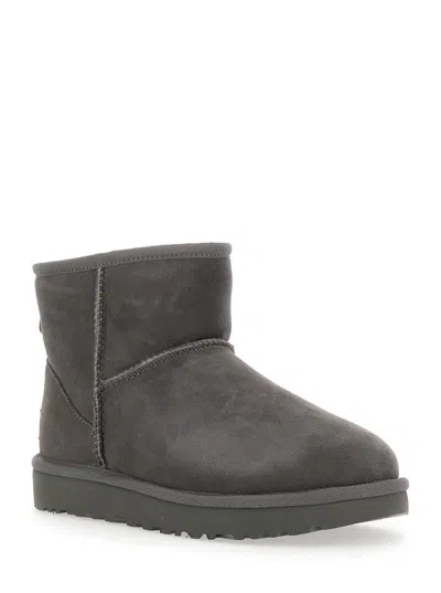Ugg 'classic Mini' Grey Ankle Boots With Logo Patch On The Rear In Suede Woman In Gray