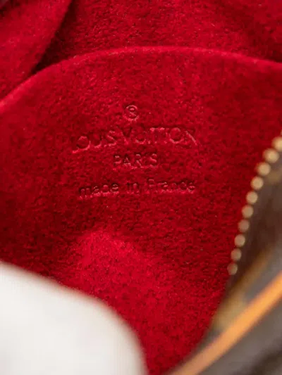 Pre-owned Louis Vuitton 2005 Monogram Trousse Wapity Pouch In Brown