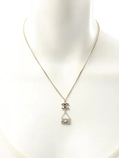Pre-owned Chanel 2003 Cc Gold Plated Enamel Flap Bag Pendant Necklace Costume Necklace In Black