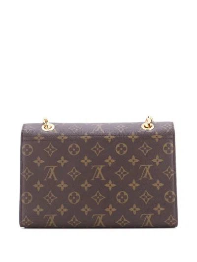 Pre-owned Louis Vuitton Victoire Handbag Monogram Canvas And Leather Shoulder Bag In Brown