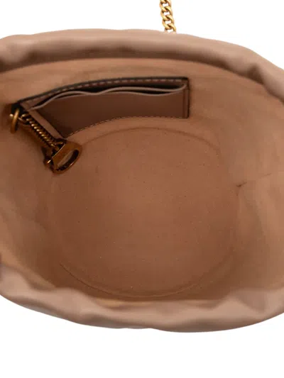 Pre-owned Gucci 2016-2025 Small Gg Marmont Leather Matelasse Bucket Bag In Brown