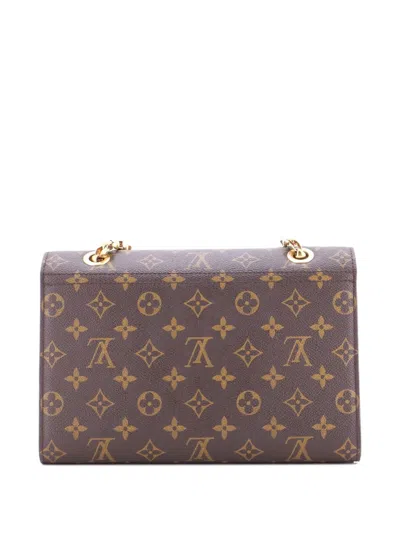 Pre-owned Louis Vuitton Victoire Handbag Monogram Canvas And Leather Shoulder Bag In Brown