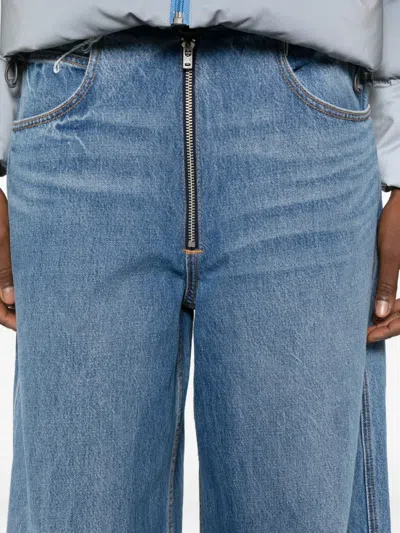 Alexander Wang Frayed Waist Wide Leg Zip-up Jeans In Blue