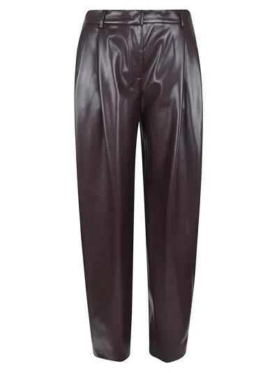 The Andamane Maxi Flare Vegan Leather Trousers In Brown